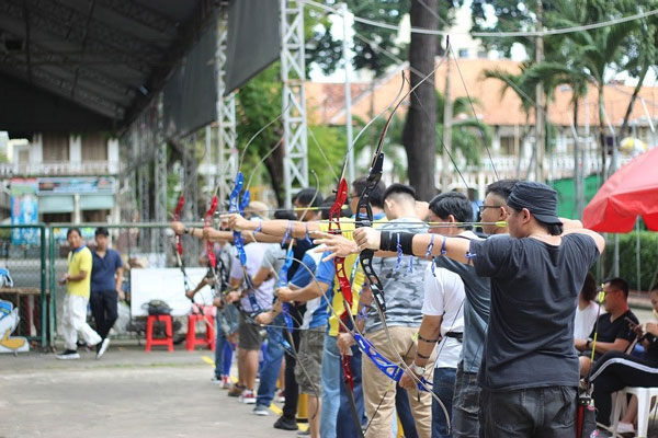 archery competitors in a line