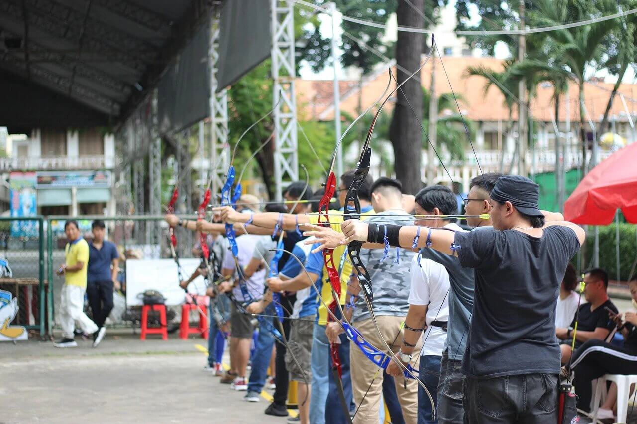 men lined up competition archery sponsorship